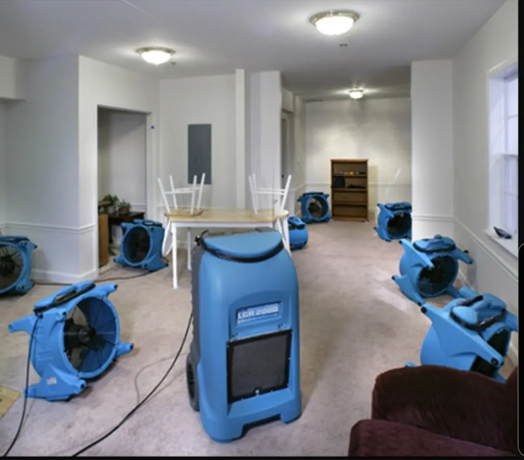 Air movers and dehumidifier setup for Water Damage Restoration in Holly Springs